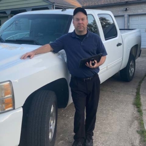 Dan in front of truck on an inspection